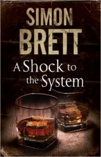 Simon Brett - A Shock To The System